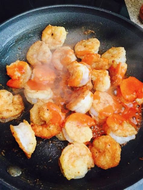 crispy-pan-fried-buffalo-shrimp-grits-and-pinecones image