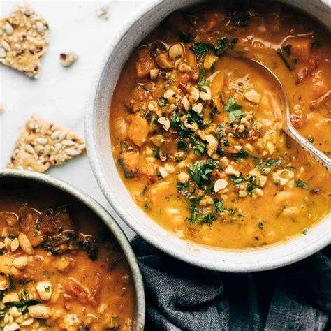 spicy-peanut-soup-with-sweet-potato-kale-pinch-of-yum image