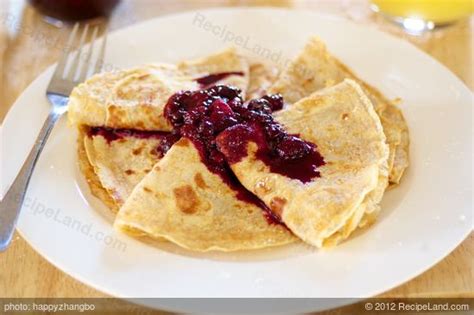 breakfast-crepes-with-warm-berry-sauce image
