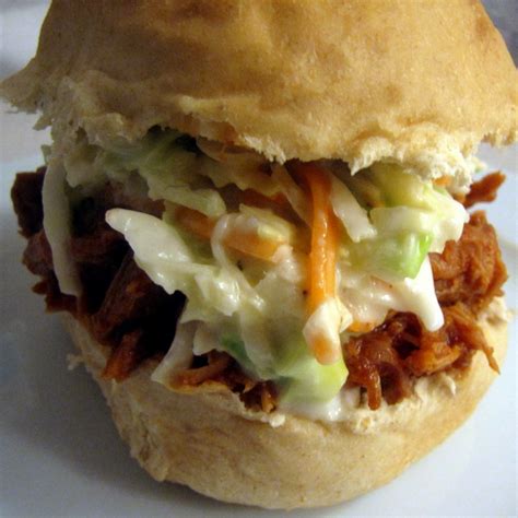 crock-pot-pulled-pork-and-coleslaw-sandwiches-tasty image