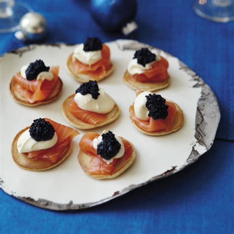 smoked-salmon-pancakes-with-sour-cream-and-caviar image