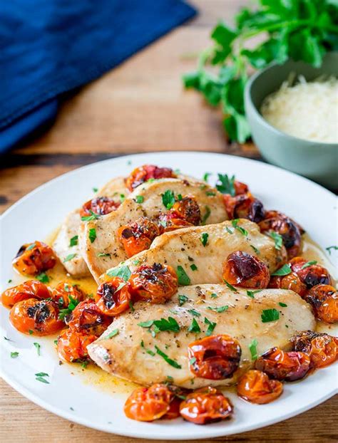 baked-chicken-with-cherry-tomatoes-sprinkles-and image