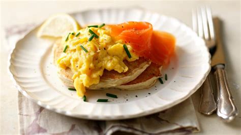 buckwheat-blinis-with-scrambled-eggs-and-salmon image