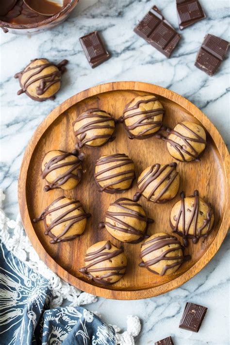 peanut-butter-cookie-dough-truffles-a-saucy-kitchen image