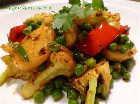 spicy-cauliflower-potato-and-peas-eveganrecipes image