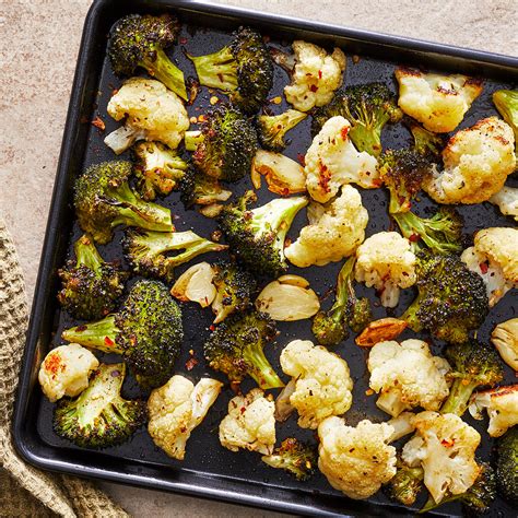 roasted-broccoli-cauliflower-eatingwell image