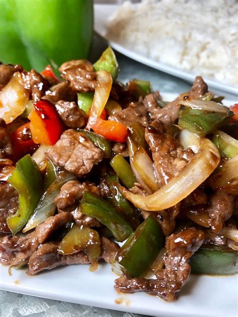 pepper-steak-is-a-tasty-asian-style-dish-served-on-a-bed image