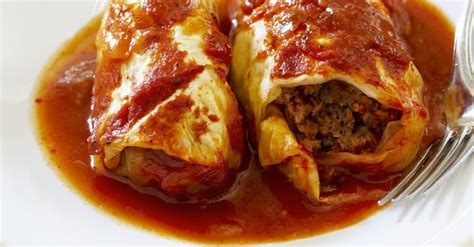 stuffed-cabbage-rolls-in-tomato-sauce-recipe-eat image