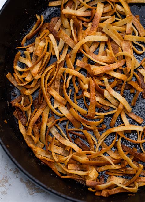 how-to-make-crispy-tortilla-strips-gimme-delicious image