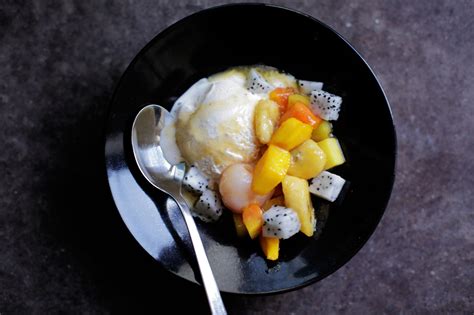 bananas-foster-with-tropical-fruit-andrew-zimmern image