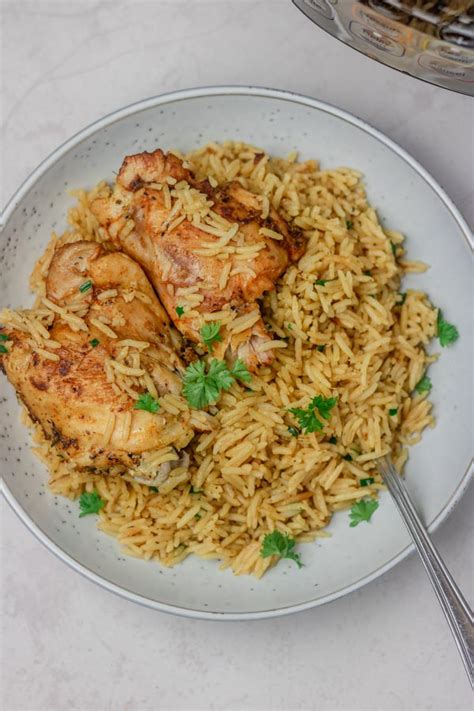 instant-pot-chicken-thighs-and-rice-the-dinner-bite image