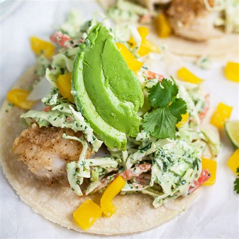 fish-tacos-with-cilantro-lime-slaw-the-rustic-foodie image