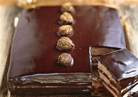 dark-chocolate-caramel-cake-with-gold-dusted-chestnuts image