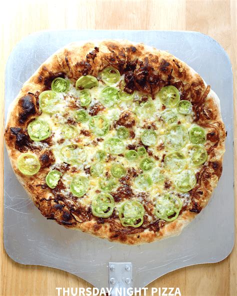 green-tomato-pizza-with-onions-and-cheddar image