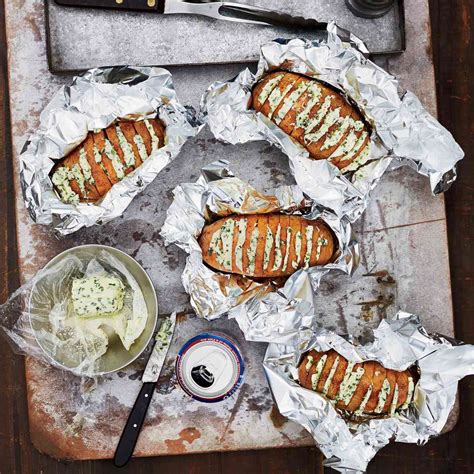 grill-baked-potatoes-with-chive-butter-recipe-tom image