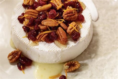 baked-brie-with-pecans-dried-cranberries image