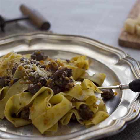 wild-boar-sauce-with-ribbon-sauce-pappardelle-al-rag image