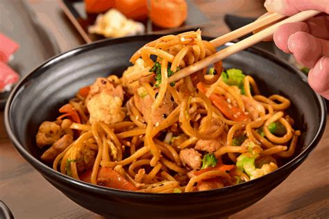 asian-inspired-delight-chicken-stir-fry-with-rice-noodles image