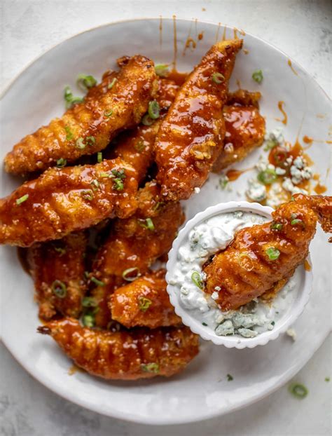 sticky-chicken-fingers-with-yogurt-blue-cheese-sauce image