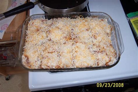 shredded-chicken-burritos-crockpot-recipe-cdkitchencom image