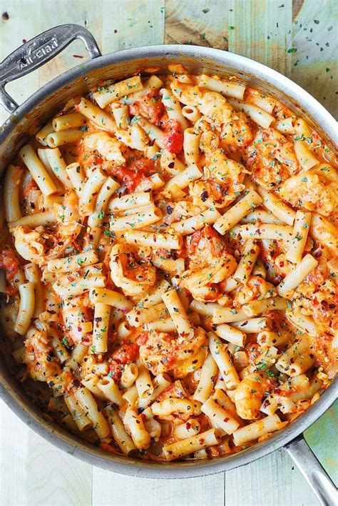 spicy-shrimp-pasta-in-garlic-tomato-cream-sauce image