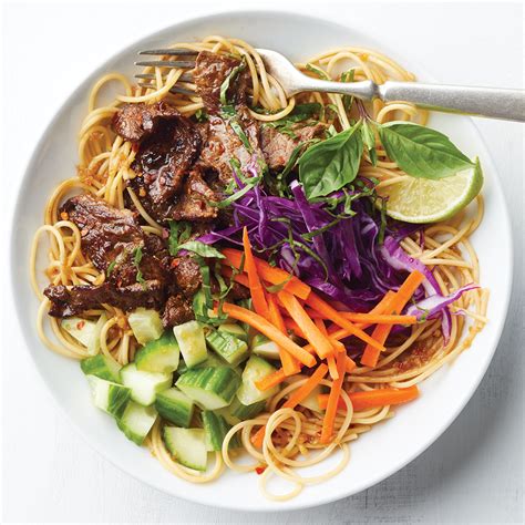 asian-beef-noodle-bowls-eatingwell image