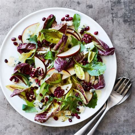pear-salad-with-blue-cheese-walnuts-and-pomegranate image