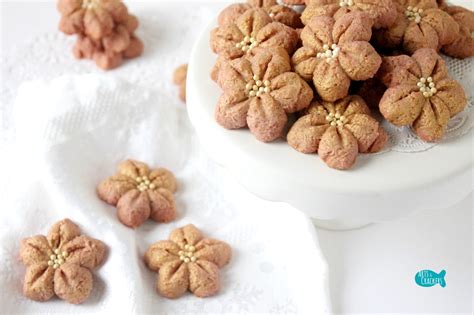 poinsettia-spritz-cookie-recipe-easy-christmas-cookies image
