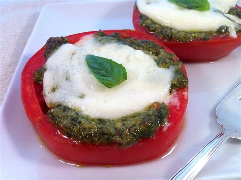 baked-tomatoes-with-mozzarella-and-pesto image