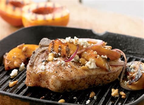 grilled-pork-chops-and-peaches-recipe-eat-this-not-that image