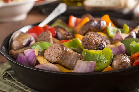 slow-cooker-sausage-and-peppers-the-spruce-eats image