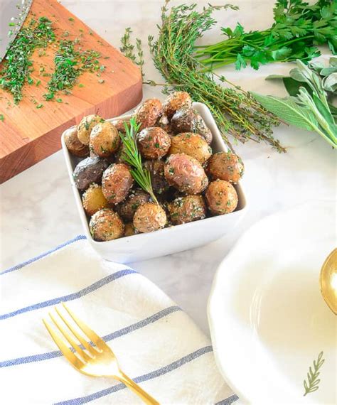 crispy-baby-potatoes-with-garlic-and-fresh-herbs image
