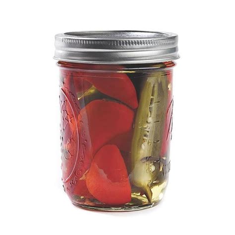 sweet-pickled-peppers-eatingwell image