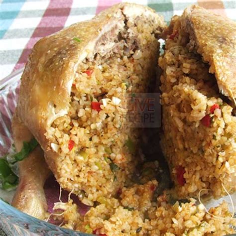 roasted-rice-stuffed-whole-chicken-give image