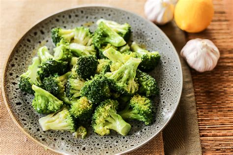 steamed-broccoli-with-olive-oil-garlic-and-lemon image
