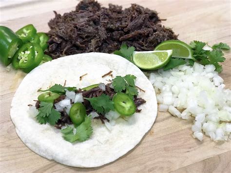 barbacoa-beef-cheek-tacos-recipe-tender-meat image