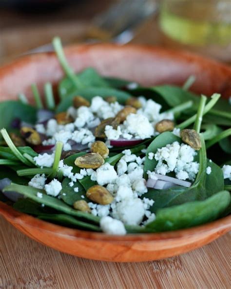 spinach-and-pistachio-salad-with-grapefruit-vinaigrette image