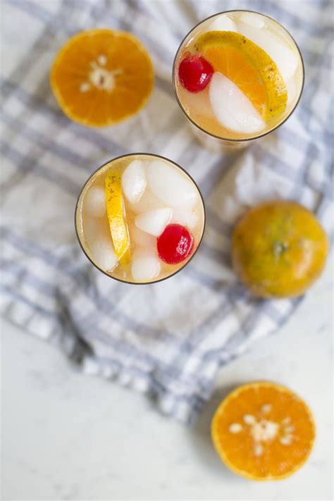 honey-tangerine-collins-cocktail-freutcake image