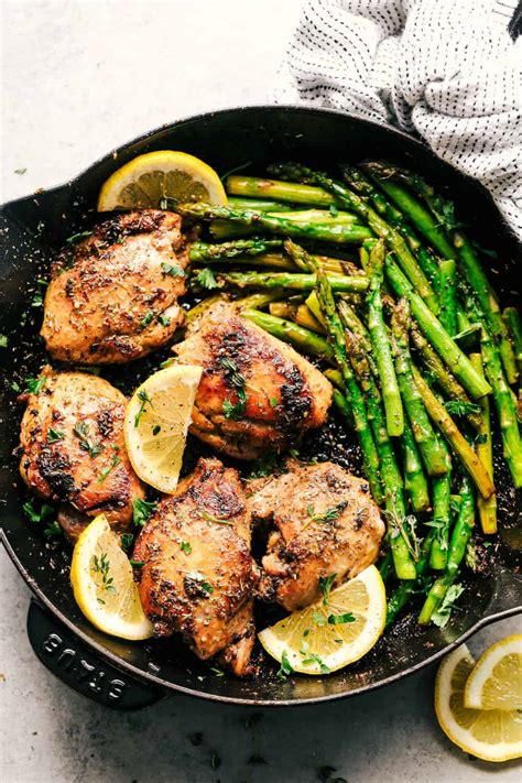lemon-garlic-butter-herb-chicken-with-asparagus-the-recipe-critic image