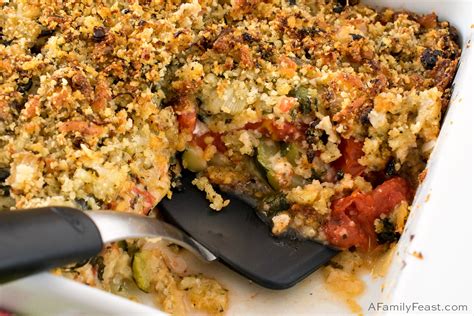 baked-tomatoes-and-zucchini-with-cheddar-parmesan image