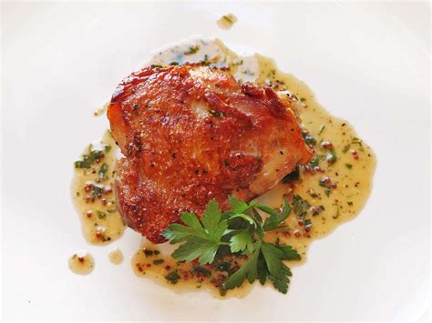 crispy-sous-vide-chicken-thighs-with-mustard-wine-pan image