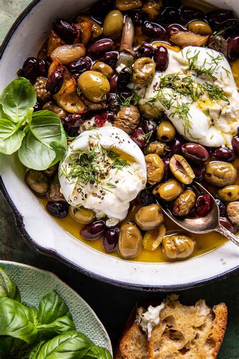 garlic-herb-roasted-olives-with-burrata-half-baked image