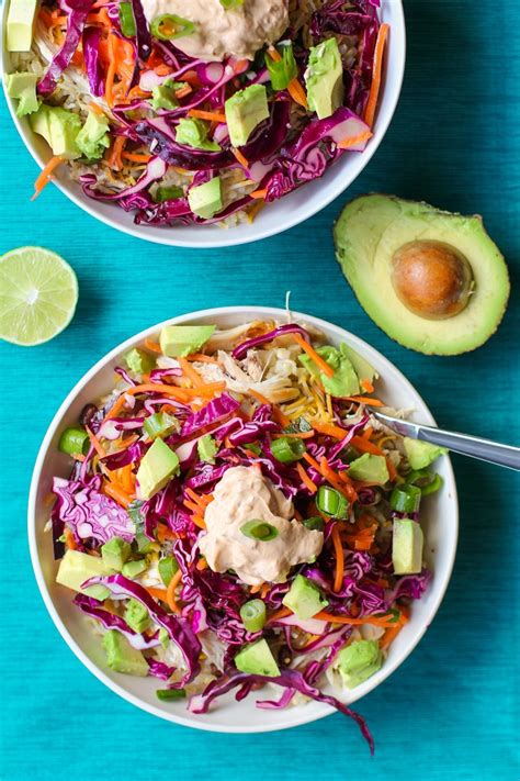 shredded-chicken-burrito-bowls-with-cabbage-slaw image