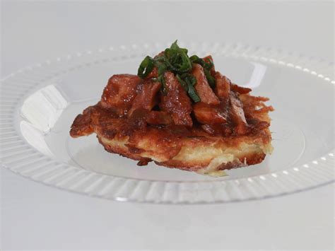 scallion-blini-with-chicken-in-tandoori-bbq-sauce image