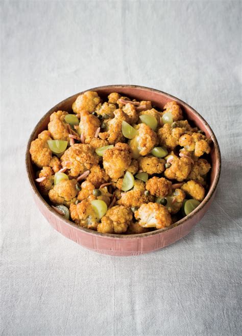 curry-roasted-cauliflower-with-almonds image