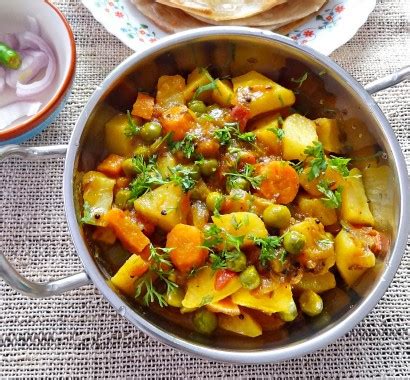 dry-potato-carrot-and-pea-curry-tasty-kitchen image