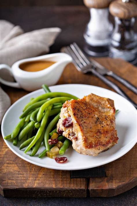 cranberry-apple-stuffed-pork-chops-recipe-with-savory image