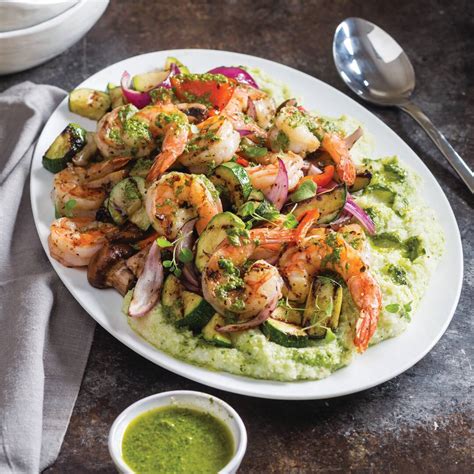 grilled-shrimp-and-summer-vegetables-with-basil-grits image