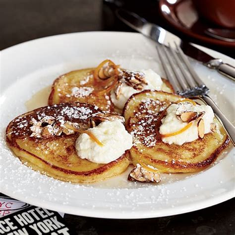 the-breslins-ricotta-pancakes-with-orange-syrup image