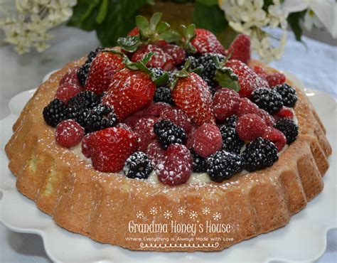 almond-berry-tiara-cake-with-fresh-raspberry image